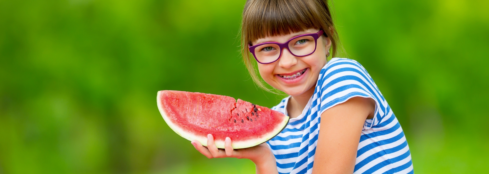 Braces-Friendly Foods - Girl With Braces Eating Watermelon