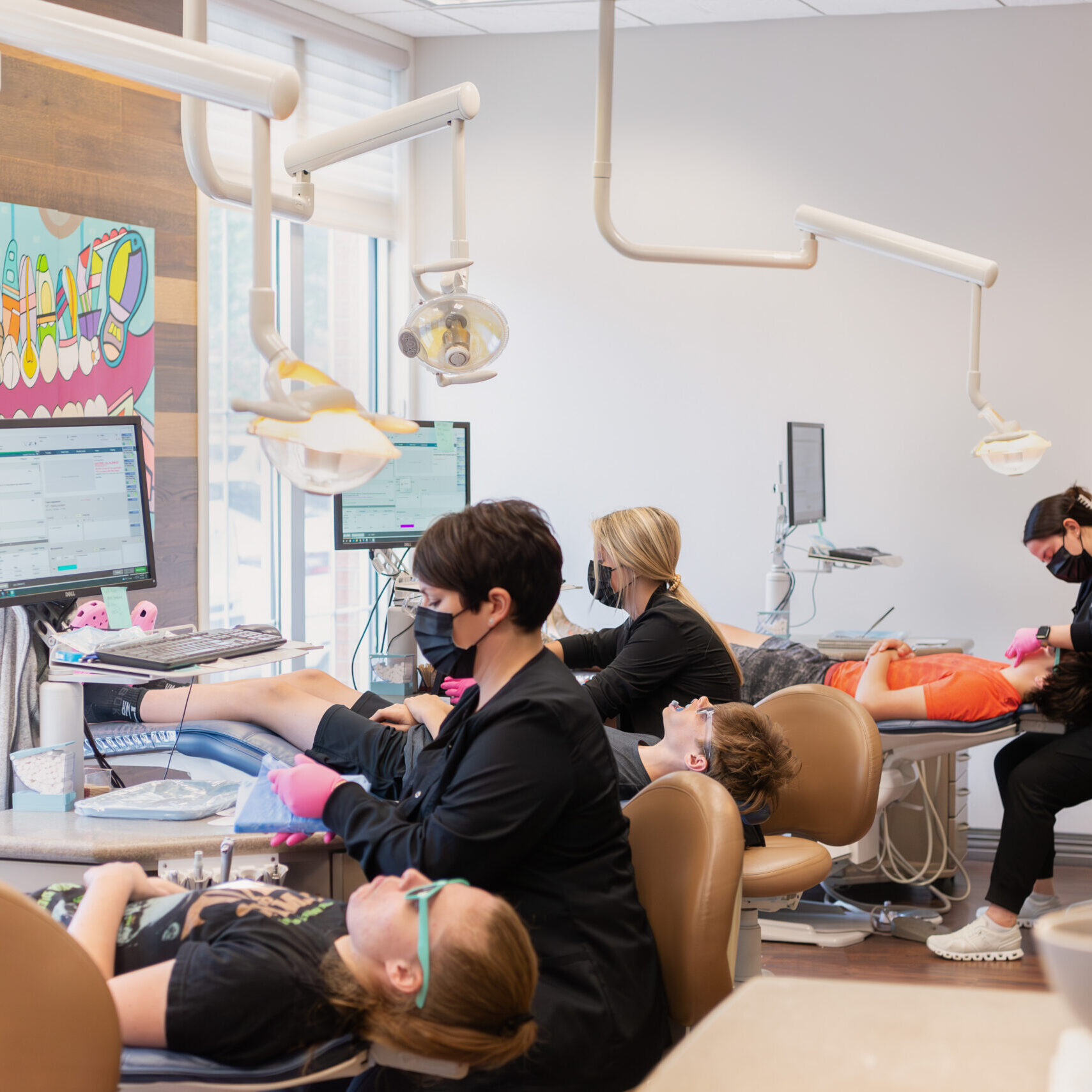 Patients receiving orthodontic treatment at Hull & Coleman Orthodontics.