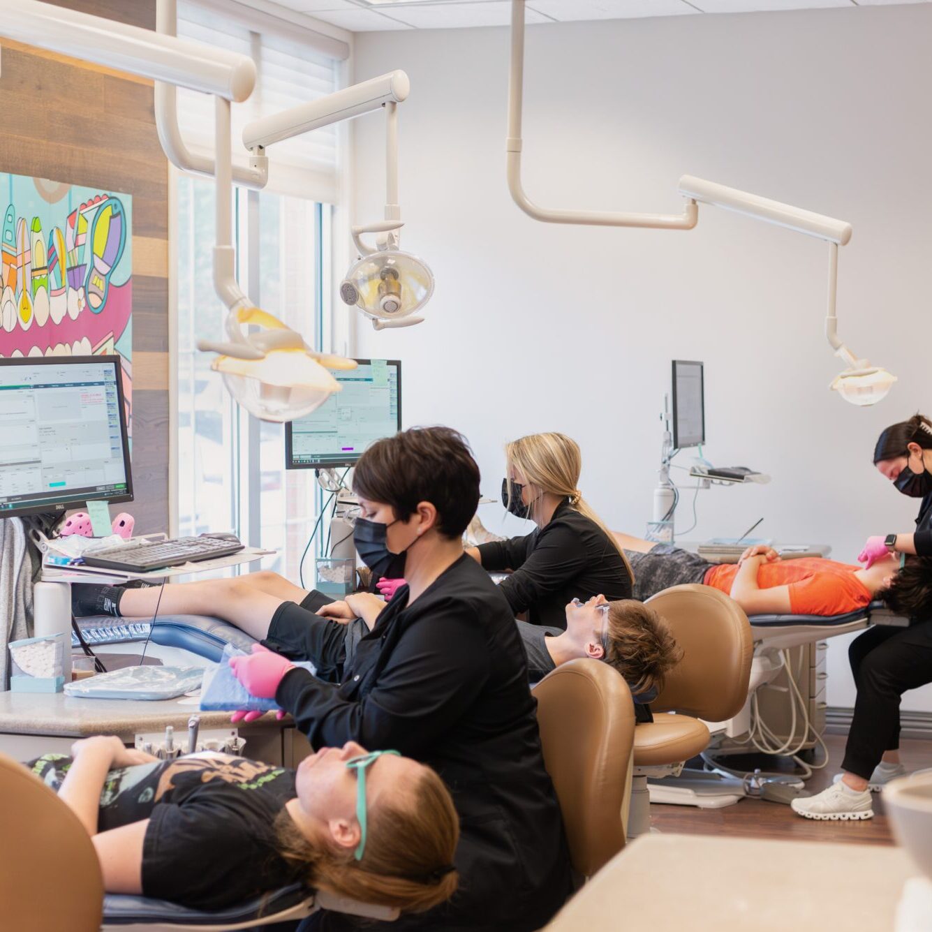 Patients receiving orthodontic treatment at Hull & Coleman Orthodontics.